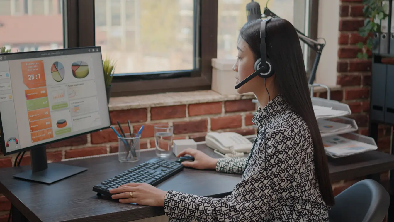 close-up-asian-woman-with-headphones-talking-phone-call-people-customer-service-consultant-using-headset-microphone-working-call-center-computer-support-chat-image-unified-voice