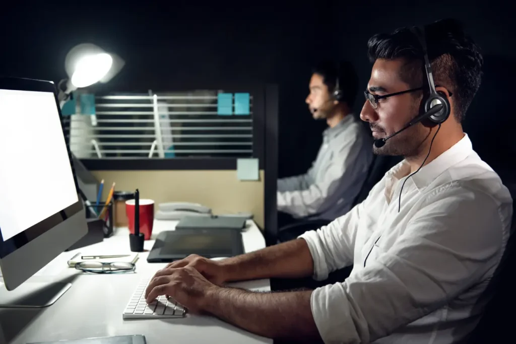 male-asian-customer-service-telemarketers-working-night-shift-call-center